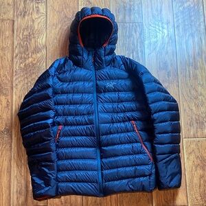 Arc'teryx mens large Dark Blue Puffer Jacket with orange accents